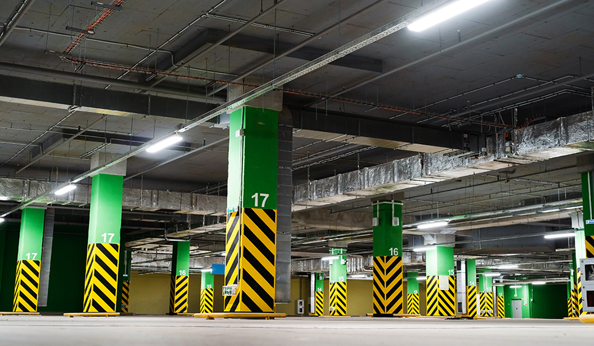 Large,Underground,Car,Park,Overlooking,A,Ceiling,Illuminated,By,Led